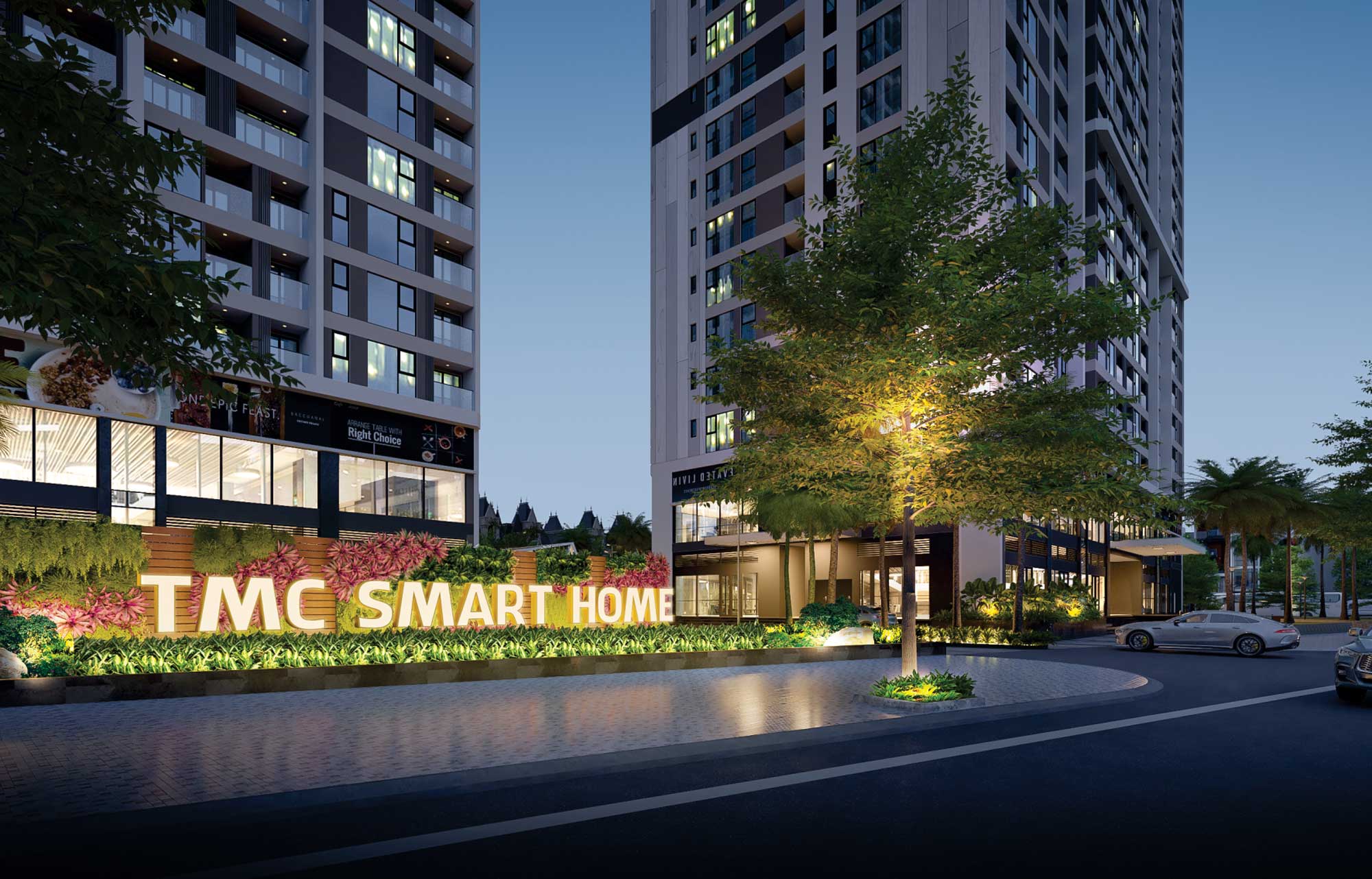 Biểu tượng t&ecirc;n dự &aacute;n TMC Smart Home được chiếu s&aacute;ng nổi bật tại lối v&agrave;o ch&iacute;nh v&agrave;o buổi tối.
